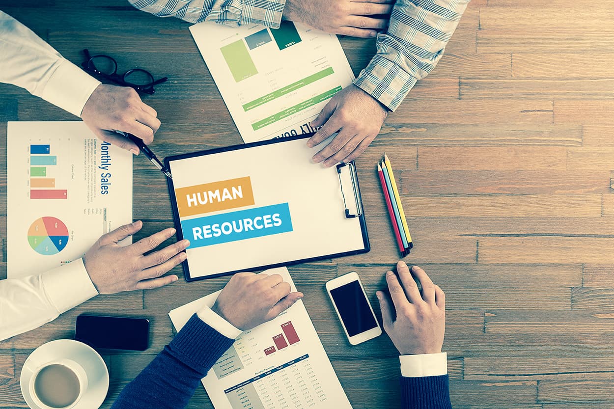 Human resources planning documents on a desk